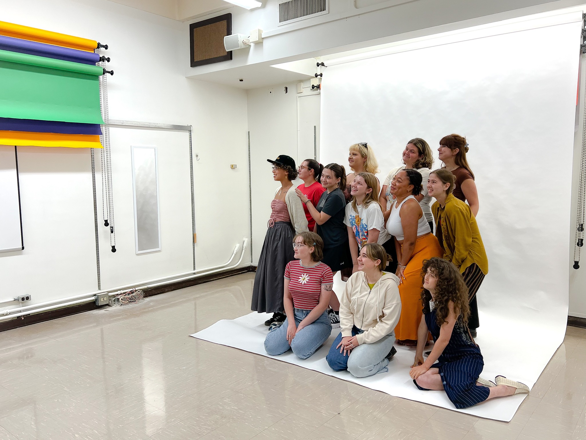 Communication Design Students pose in the photo studio on campus at Stephens College.