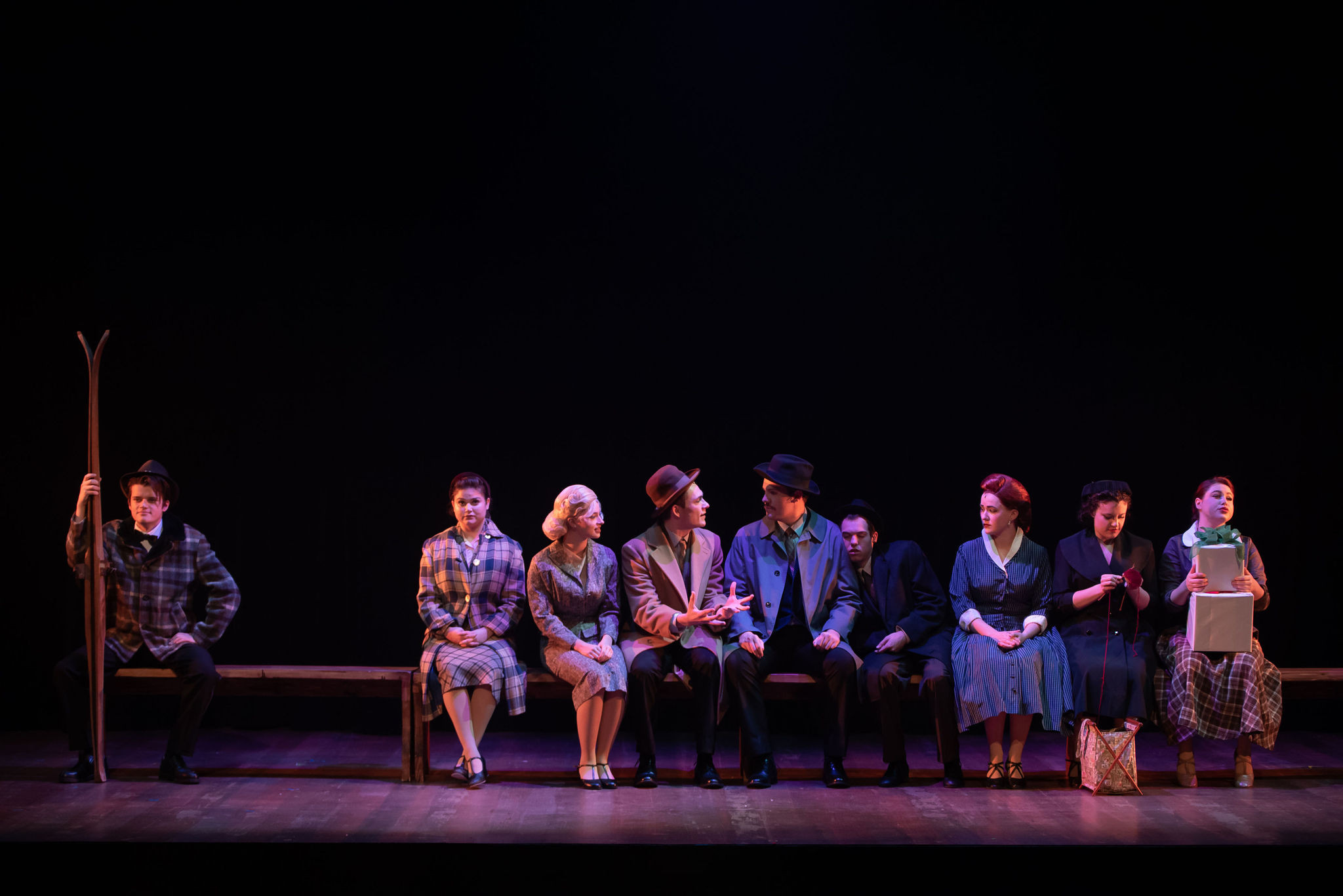 Actors on stage in a production of White Christmas.