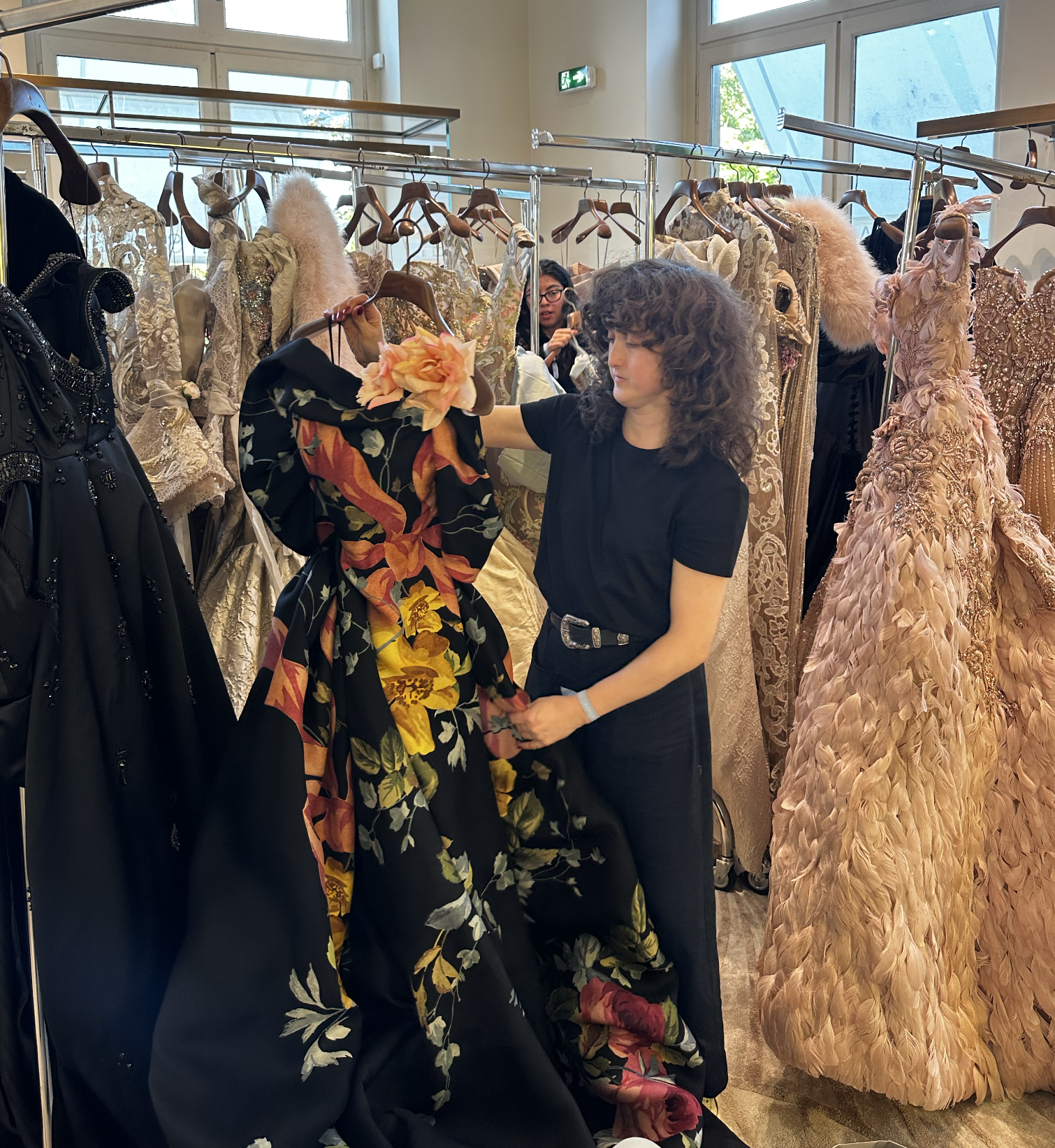 Claire Johnson '25 selecting couture gowns in Paris