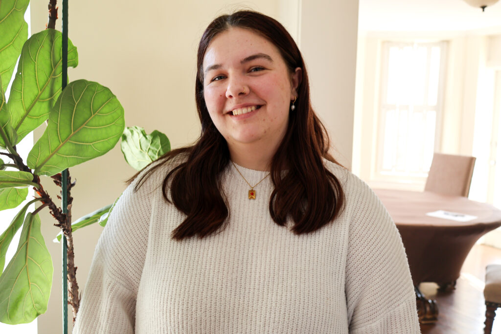 Ally Hicks smiling in her headshot