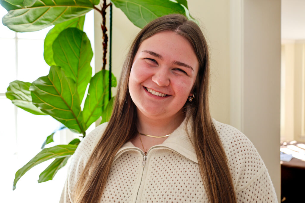 Eliza Stevens smiling in her headshot