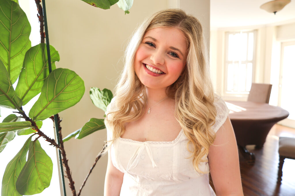Olivia Starnes smiling in her headshot