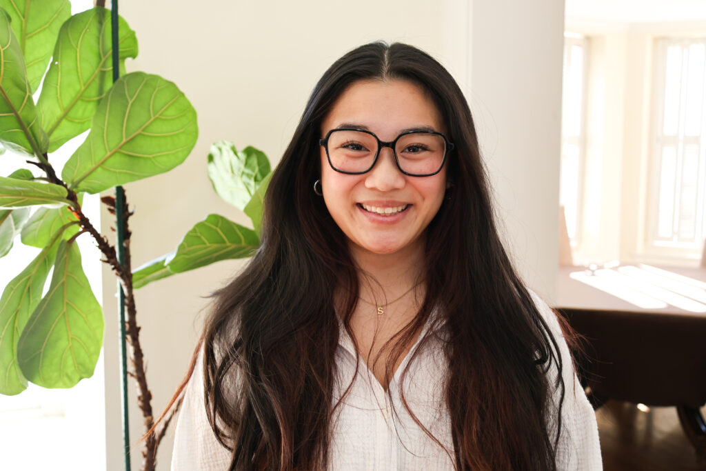 Savina Do smiling in her headshot