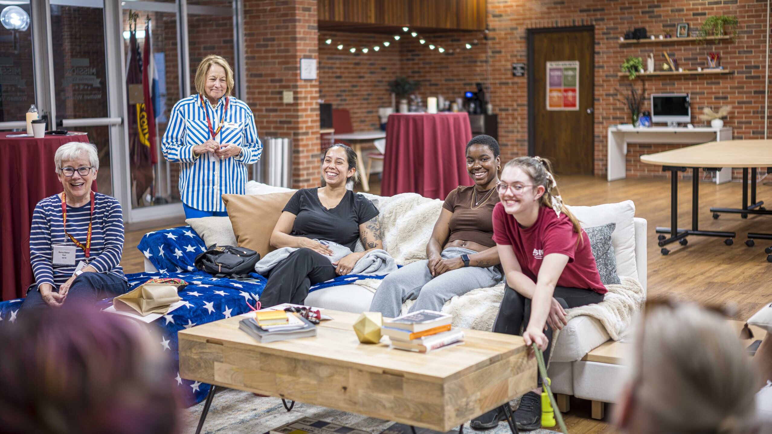 students laughing while hanging out at the SC veterans center.