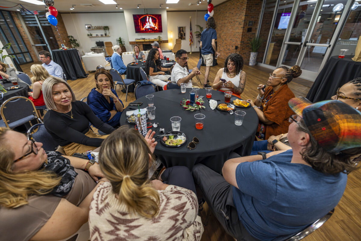 People gathering at an event held at the Center of Excellence for Veteran Student Success.